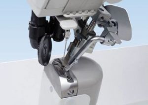 DÜRKOPP ADLER  888-167122 M Machine pilier , point noué 1  aiguilles triple entraînement par double alimentation de roue , par aiguille et pied presseur à roulette commandé,coupe fil automatique, spécialistes de la doublure.