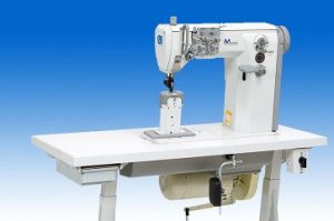 DÜRKOPP ADLER  888-260020 Machine pilier , point noué double  aiguilles triple entraînement par double alimentation de roue , par aiguille et pied presseur à roulette commandé