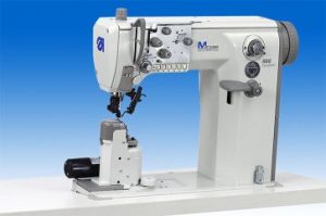 DÜRKOPP ADLER   888-356152  Machine  à sommier à gauche pour l’insertion de la doublure et de la sous-coupe, point noué, avec entraînement  par roue et par aiguille et avec roulette motorisée .